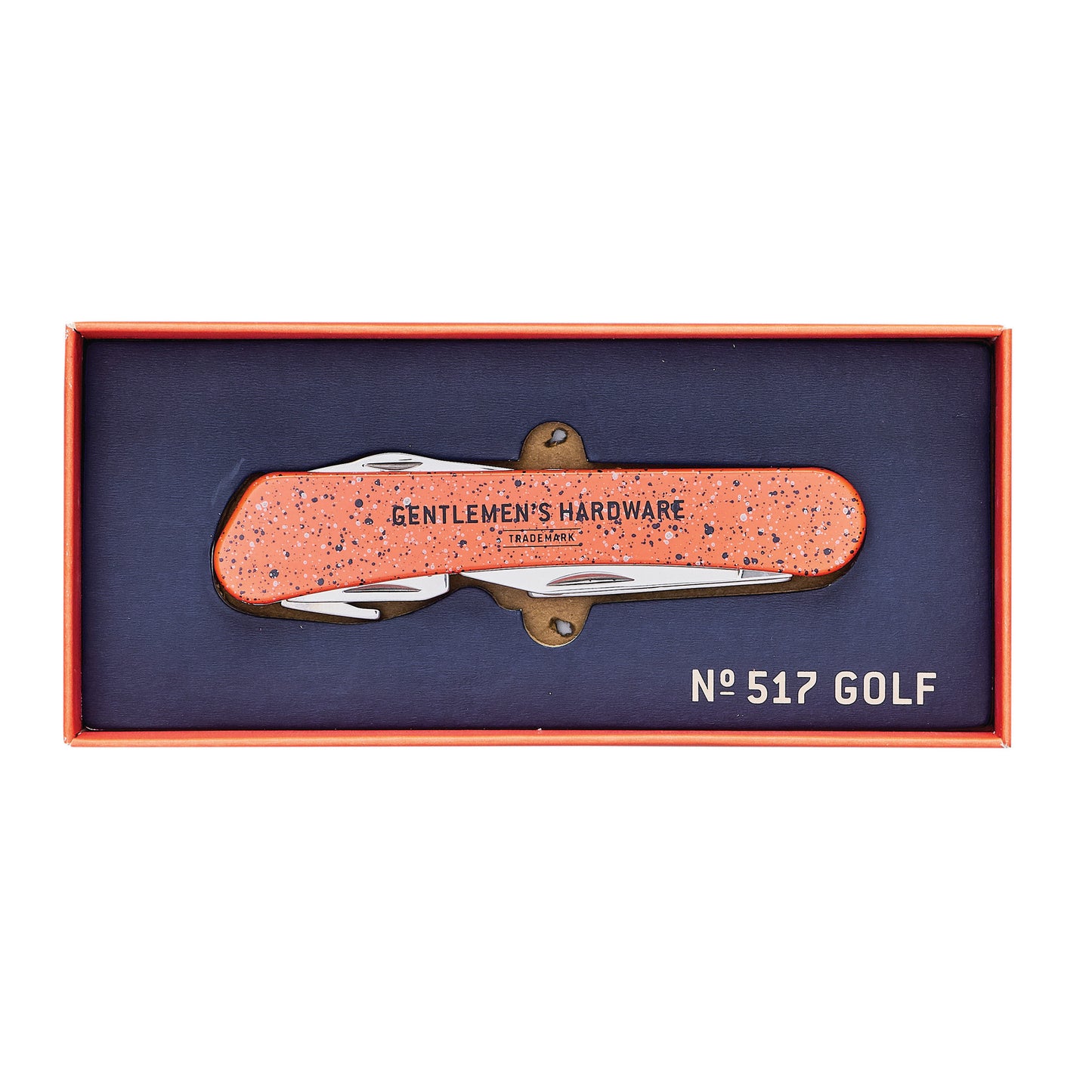 The Golf Multi Tool, labeled Gentlemen’s Hardware and boxed with “No 517 Golf,” features a speckled orange handle and several metal tools, including a divot tool—ideal for any caddy bag.