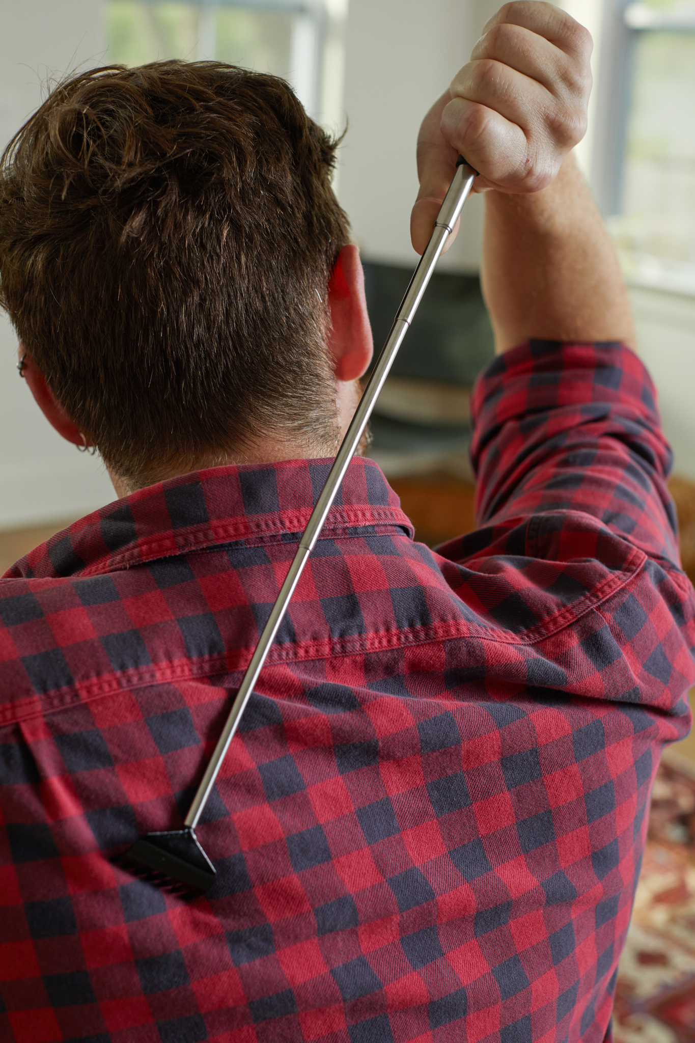 Back scratcher in use.