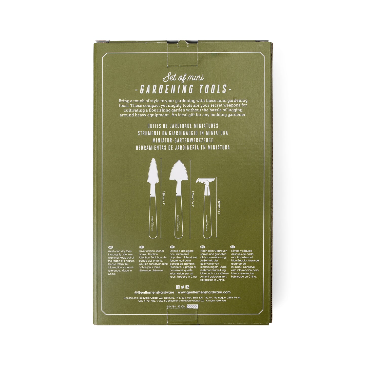 Compact and durable green box labeled Mini Garden Tools, with illustrations and descriptions of a trowel, transplanter, and cultivator on the back. Text is presented in multiple languages.