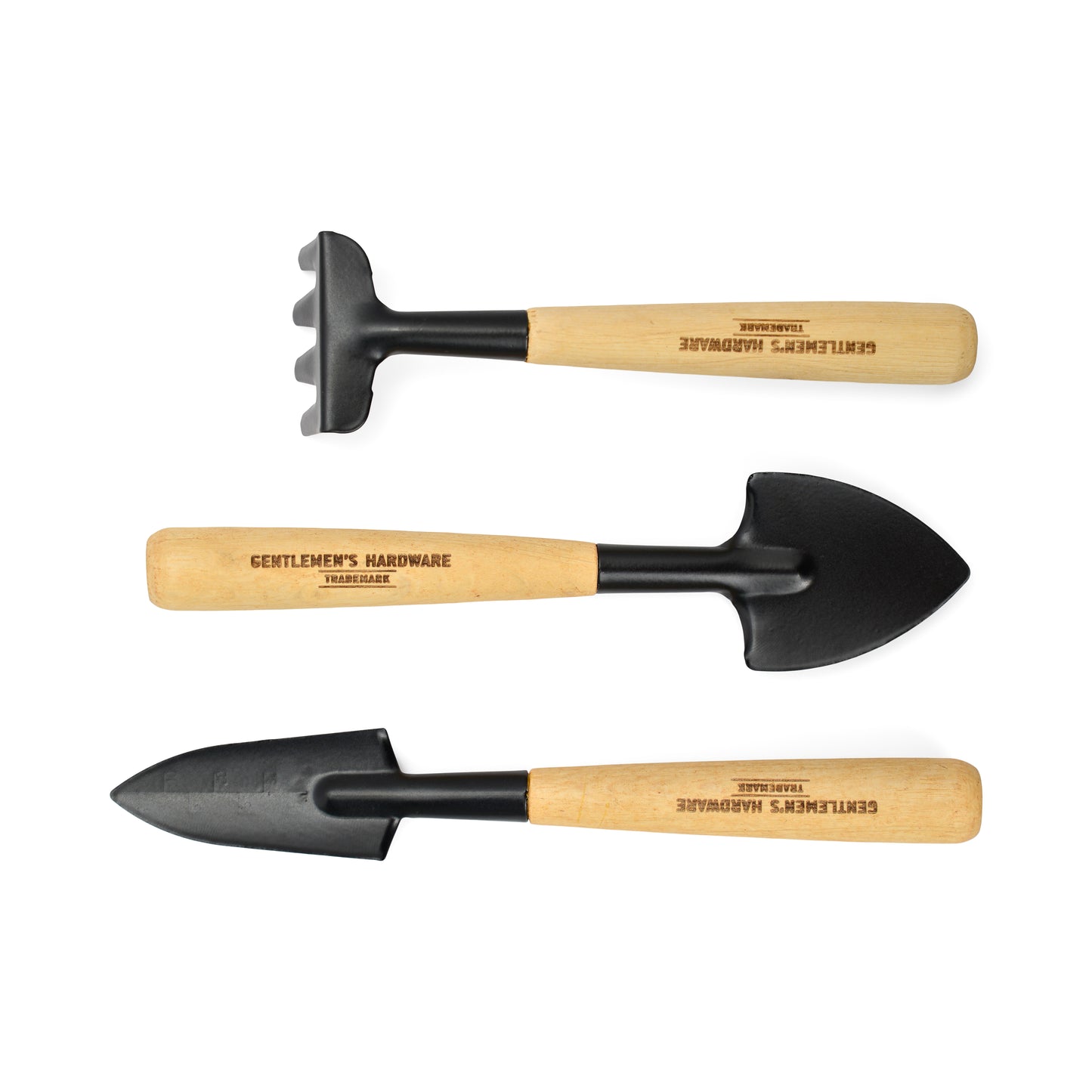 Three compact, durable Mini Garden Tools with wooden handles and black metal heads are arranged horizontally on a white background.