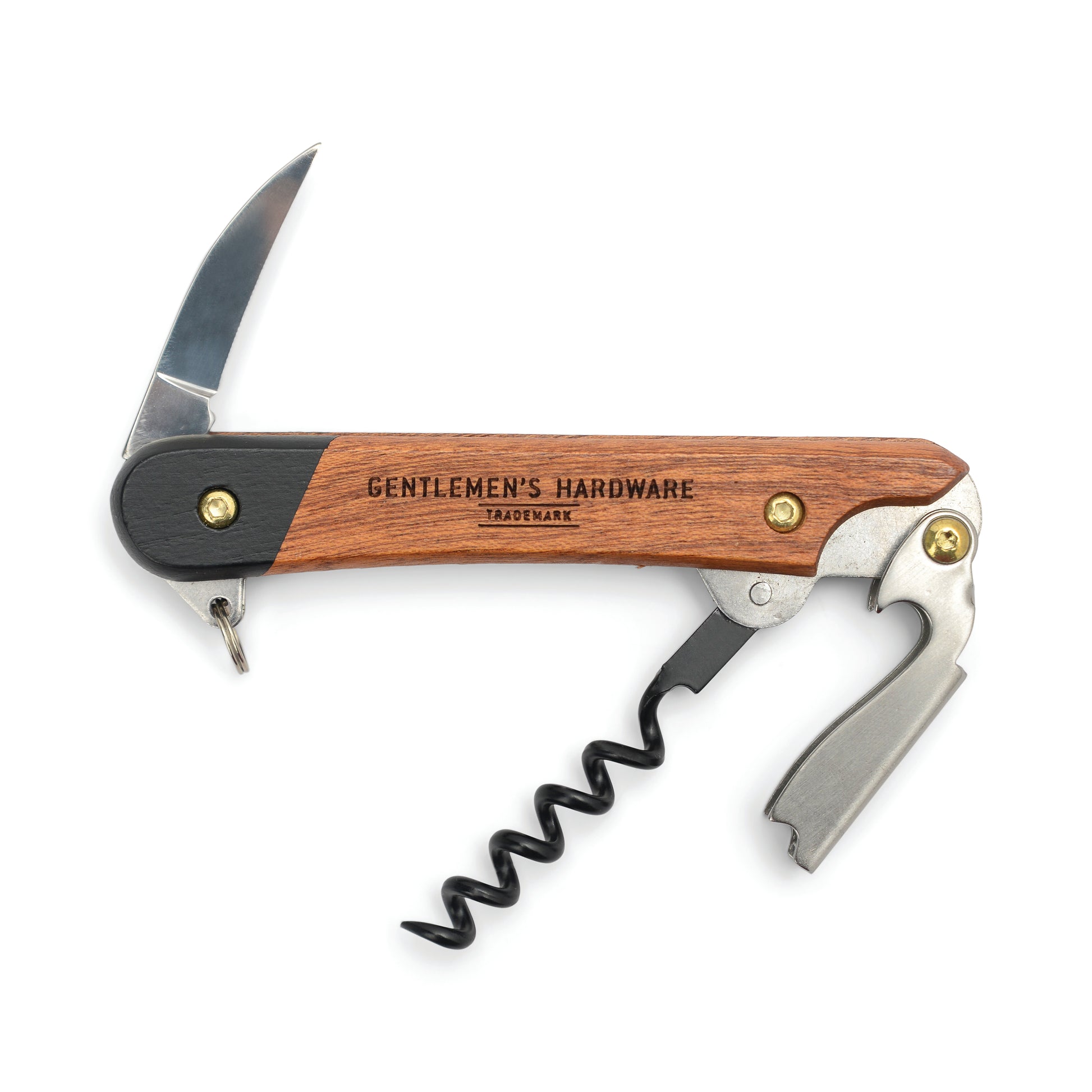 The Waiters Friend is a wooden-handled multi-tool corkscrew with a serrated foil cutter, bottle opener, and small knife, each labeled with the Gentlemens Hardware Trademark.