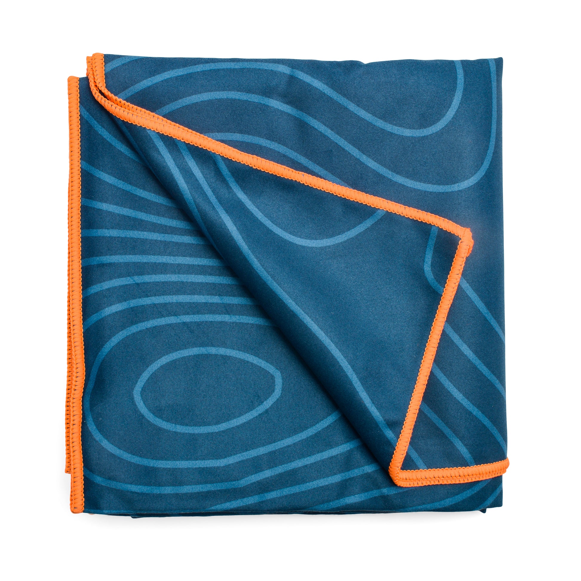 A folded Travel Towel made of blue microfibre with light blue wavy patterns and orange trim, shown on a white background.