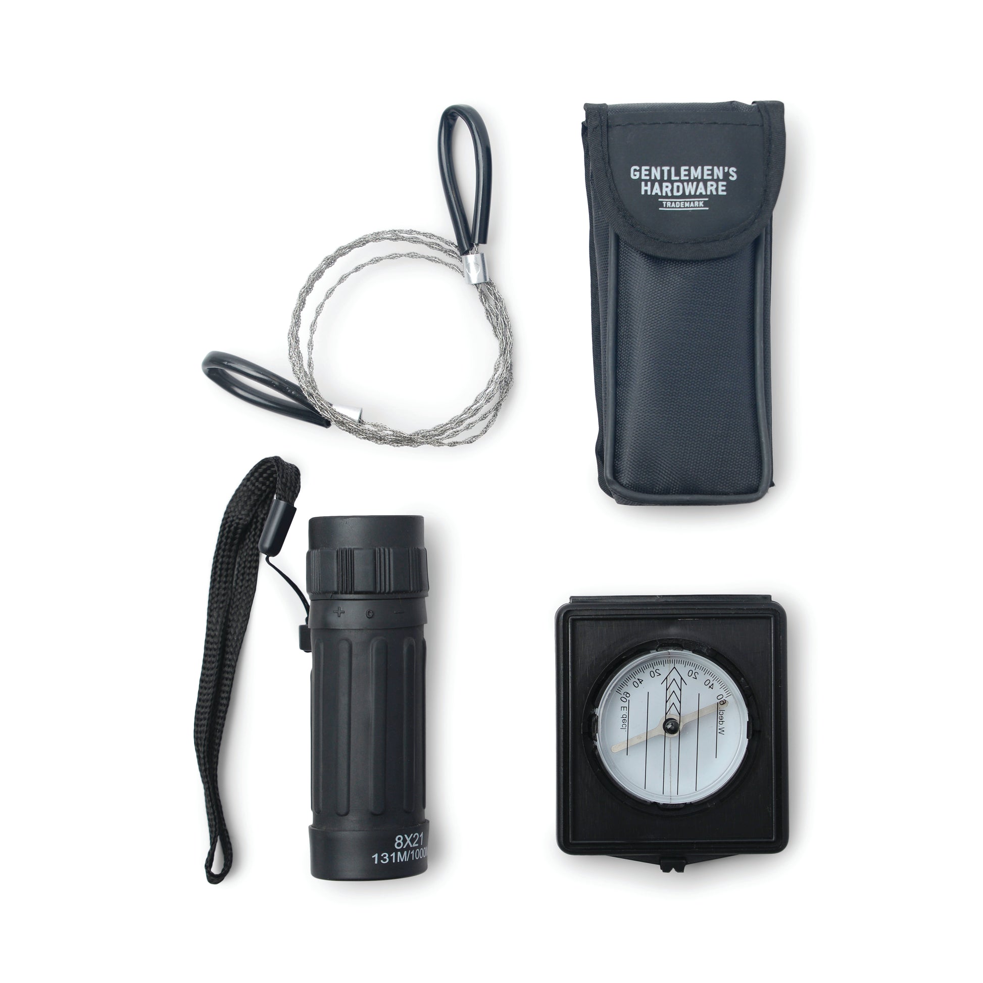 Prepare for adventure with the Explorer Kit: includes a wire saw, black monocular, compass in a square case, and Gentlemens Hardware pouch—everything you need for exploring the outdoors.