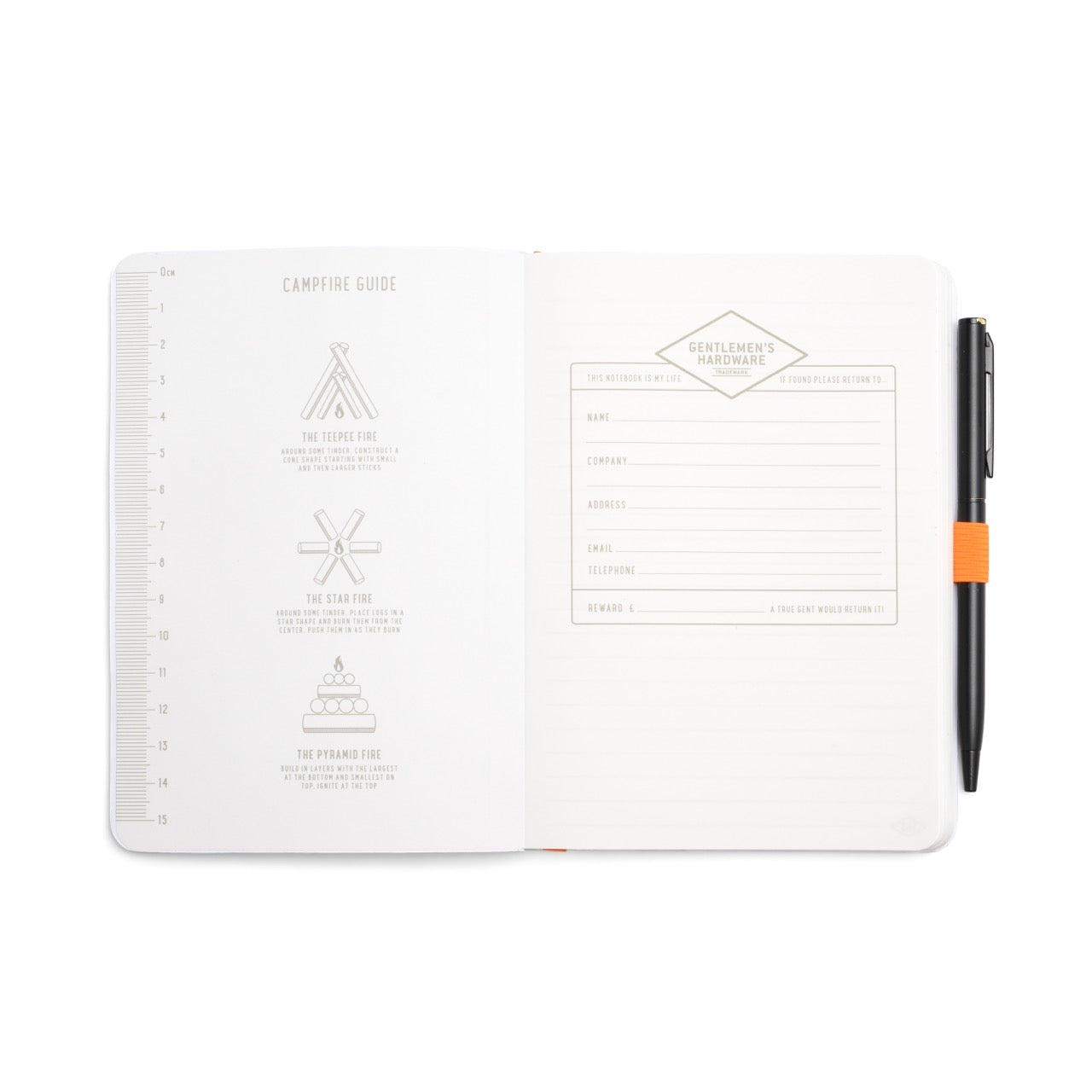 A Waterproof Notebook lies open, showing a campfire guide with diagrams on the left page and a personal info form on the right; a black pen is attached to the side.