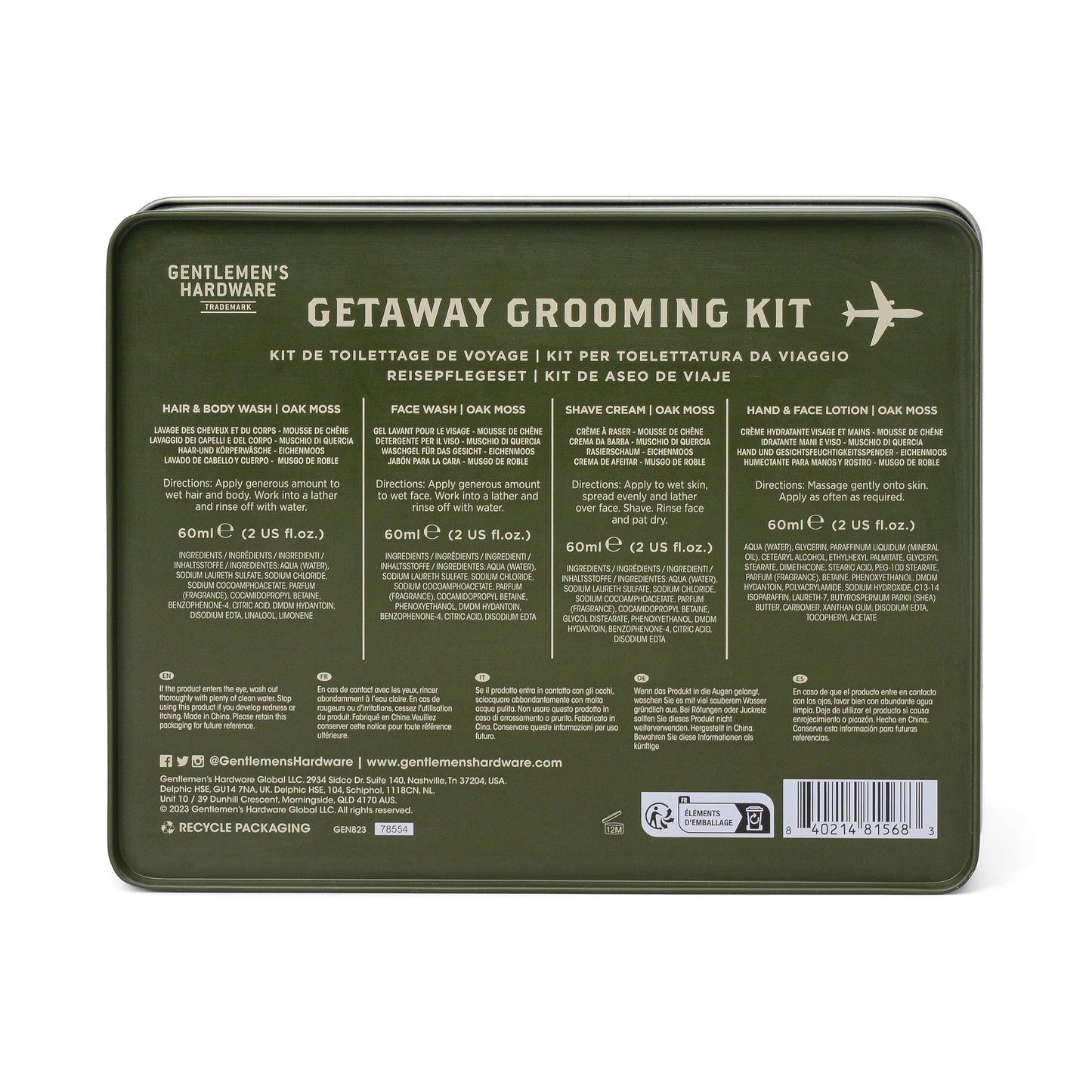 The Getaway Grooming Kit comes in a green tin and includes vegan hair & body wash, face wash, shave cream, and hand & face lotion with multilingual descriptions—ideal as a travel accessory.