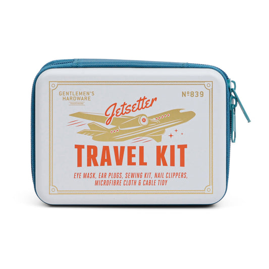 The Jet Setter Kit is a blue and white, pocket-sized travel kit featuring airplane illustrations; includes a zippered pouch with an eye mask, ear plugs, and nail clippers—ideal for convenient travel.