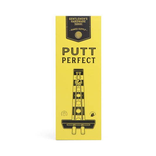 The yellow rectangular Putt Perfect box from Gentlemens Hardware features a tabletop golf game illustration and lets you practice golf like a pro anywhere.