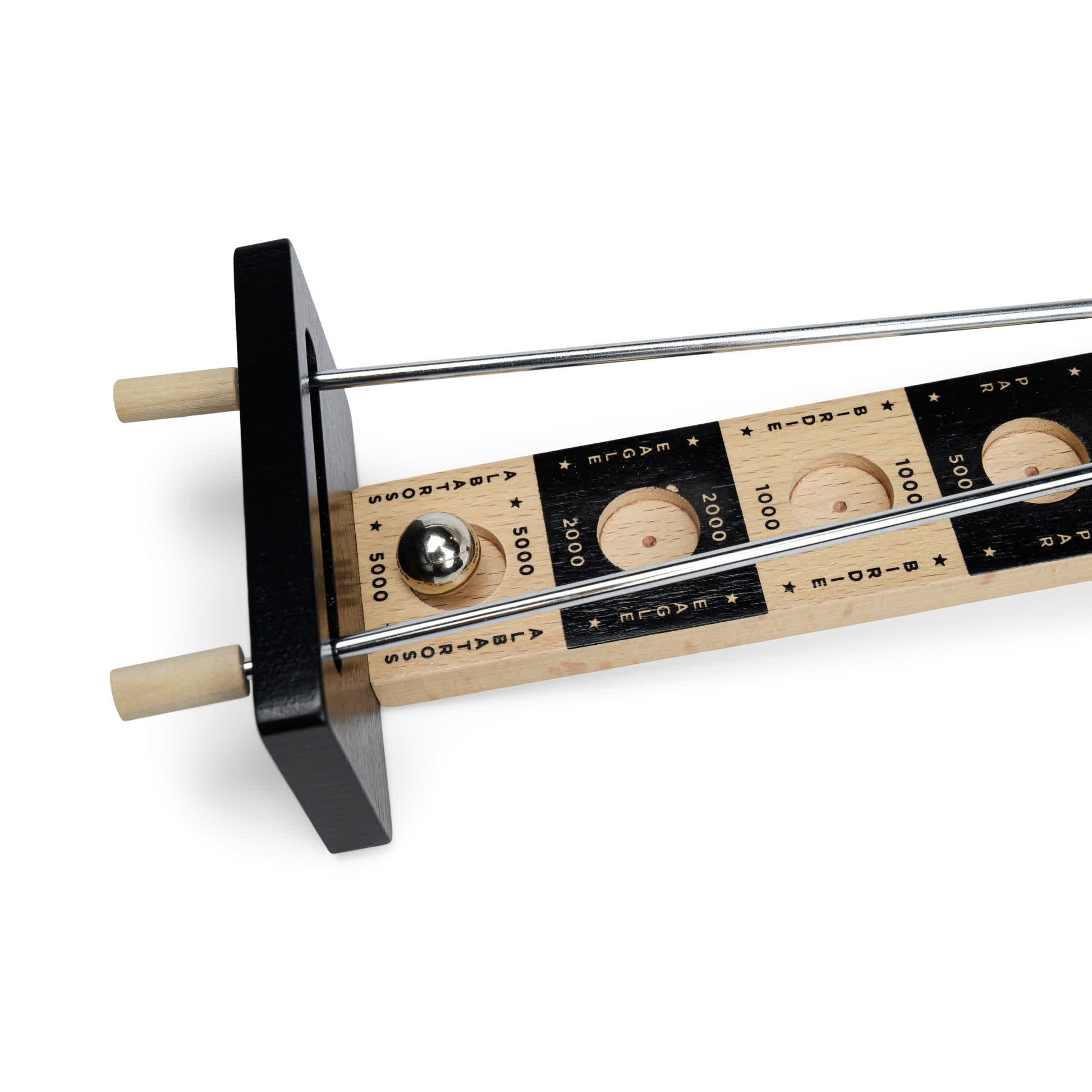 A metal ball sits on Putt Perfect’s wooden shuffleboard-style scoring track, featuring numbered slots and metal rods—ready for your winning shot just like a pro golfer.