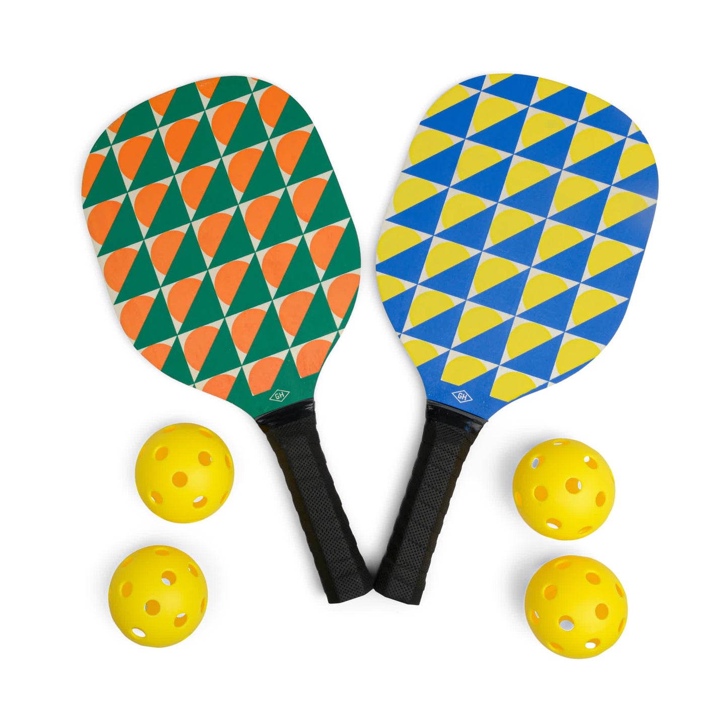 The Pickle Ball Set includes two patterned paddles—one with orange and green shapes, the other blue and yellow—alongside four yellow pickleballs, making it ideal for exciting games and friendly matches.