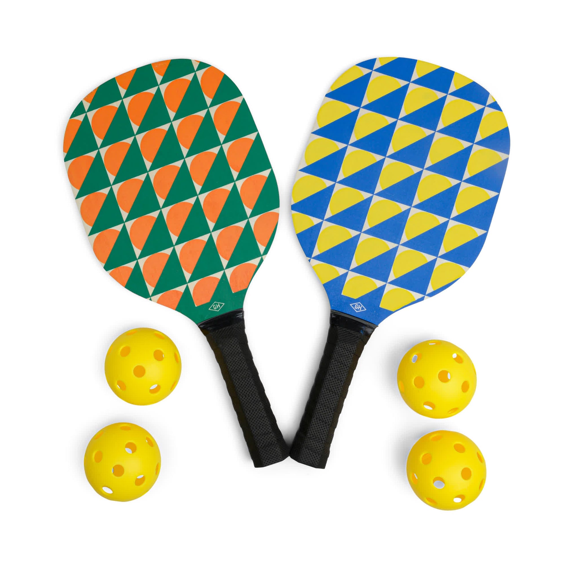 The Pickle Ball Set includes two patterned paddles—one with orange and green shapes, the other blue and yellow—alongside four yellow pickleballs, making it ideal for exciting games and friendly matches.