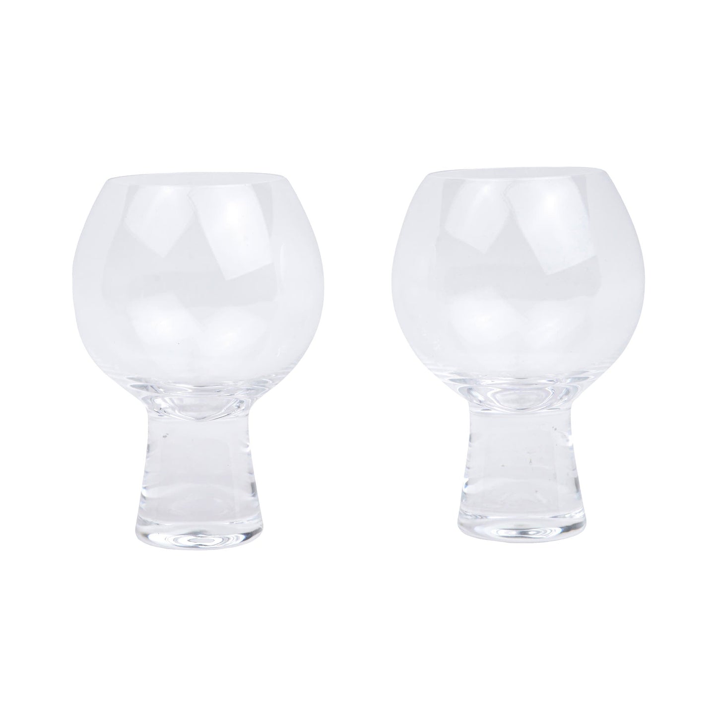 The Gin Glass - Set Of 2 features clear, stemless glasses with rounded goblet-shaped bowls and flat bases, displayed side by side against a white background for an elegant look.