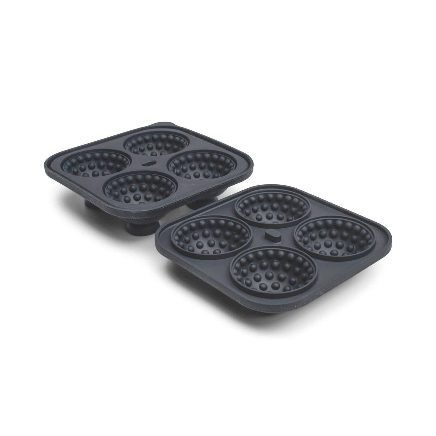 The Golf Ball Ice Mould includes two black silicone trays, each with four round, dimpled cavities—ideal for golf lovers to make golf ball ice or bake dome-shaped treats.