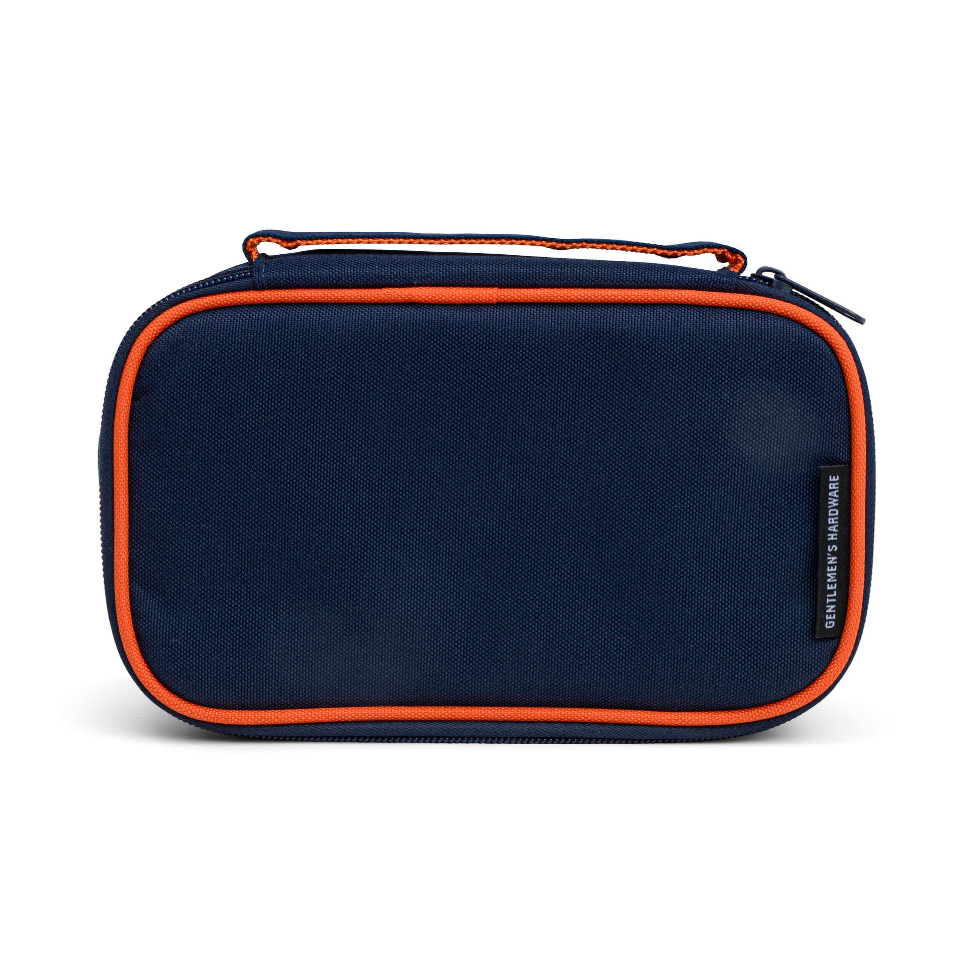The Tech Tidy Case is a rectangular navy blue zippered pouch with orange trim, a top handle, and a small right-side label—ideal for clutter-free organization in any workspace.