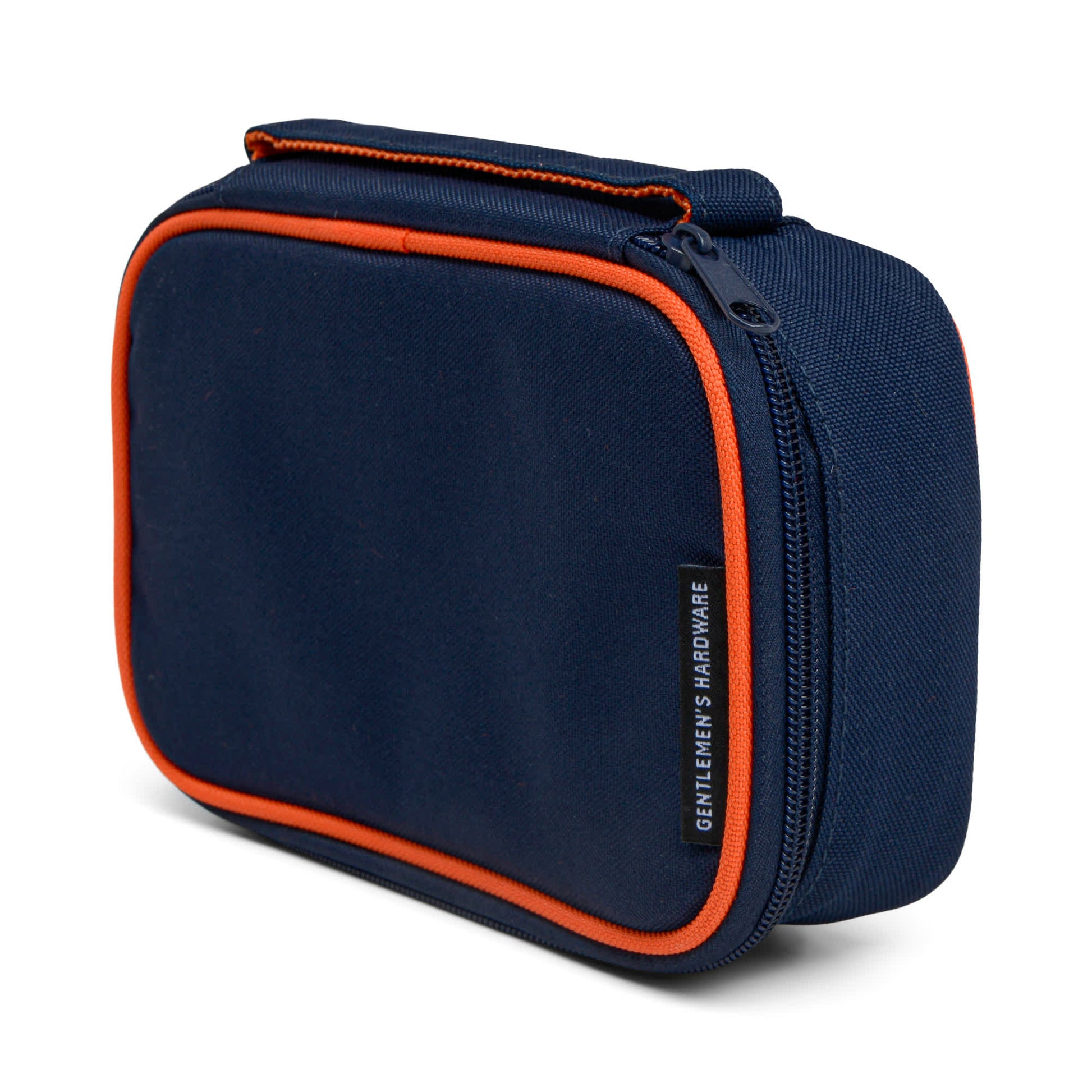 A navy blue zippered Tech Tidy Case with orange trim and a GENTLEMENS HARDWARE label on the front—ideal for keeping your workspace organized and clutter-free.