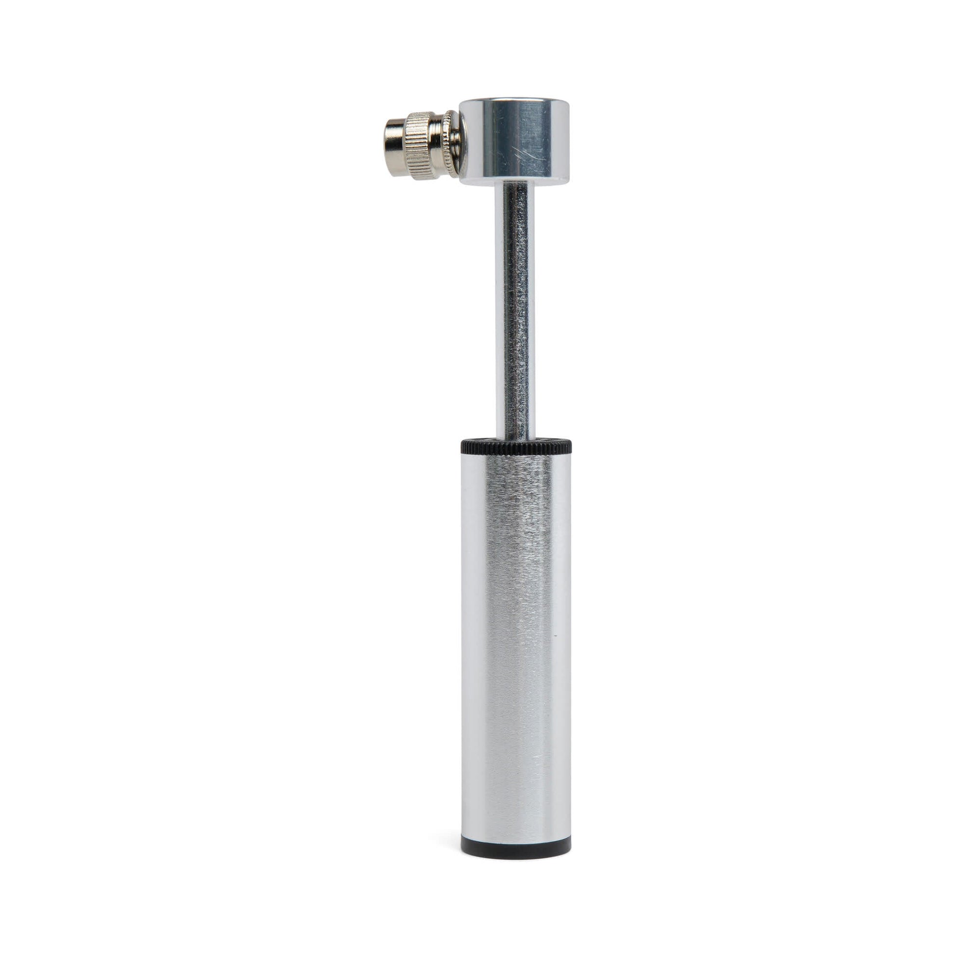 The Mini Bike Pump is a compact, silver pump with a cylindrical body and top nozzle, standing upright on a white background; comes with valve adapters for versatile use.
