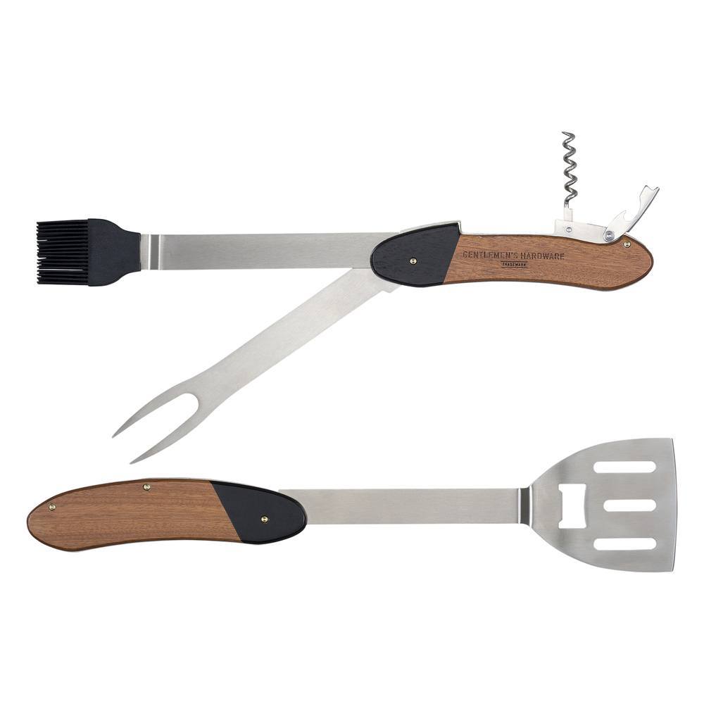 The BBQ Multi-Tool features wooden handles and includes a spatula, fork, basting brush, and corkscrew—ideal for outdoor use. Shown both open and closed for convenience.