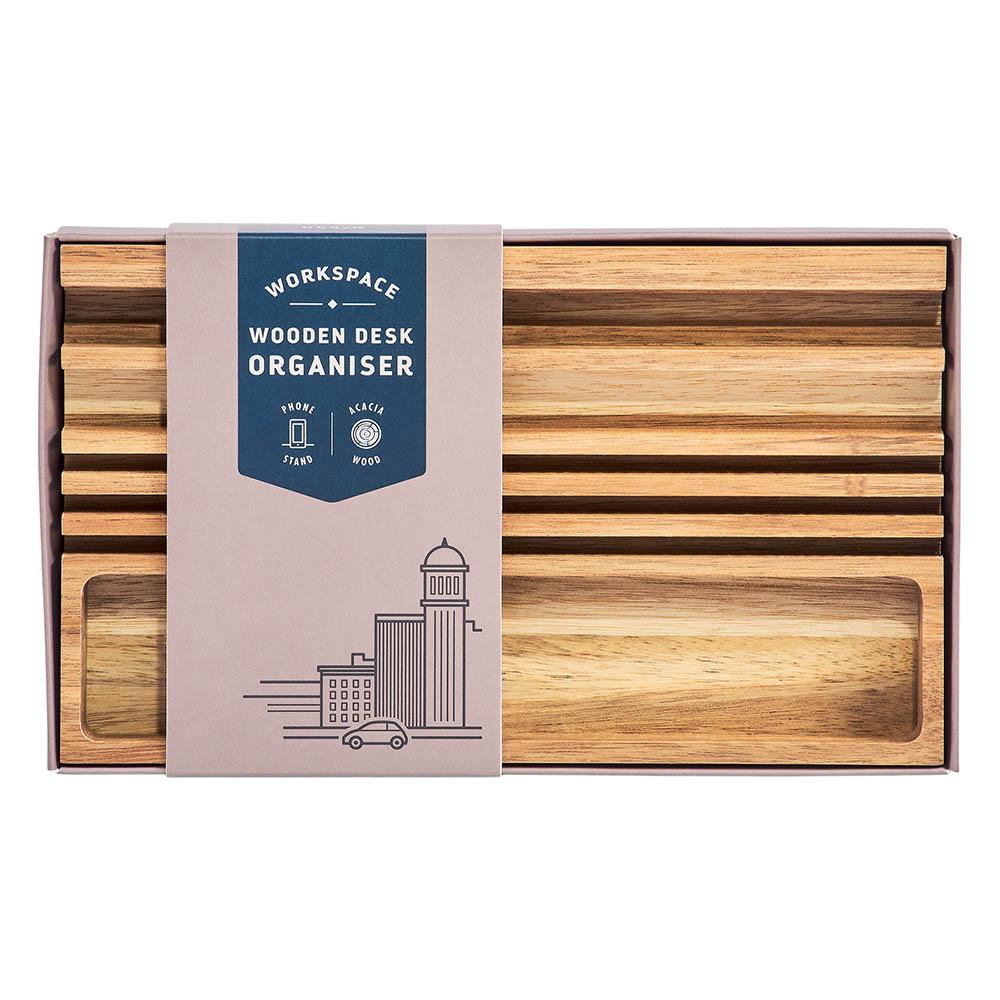 A boxed Wooden Desk Organizer & Phone Stand with compartments, made from acacia wood and labeled as Workspace Wooden Desk Organiser on the packaging.