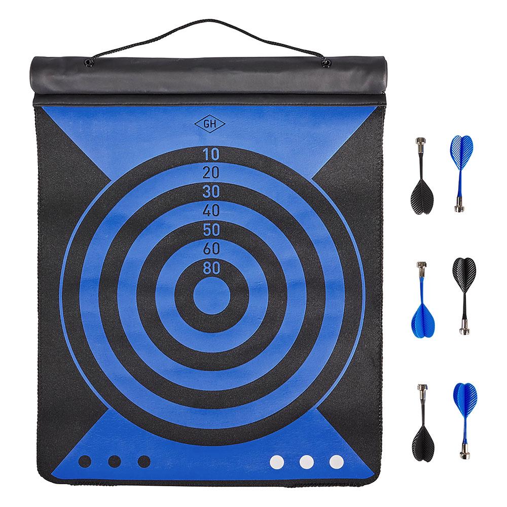 The Magnetic Dartboard Roll, featuring blue and black rings numbered 10 to 80, hangs on the wall. Six black darts—three with blue tails and three with black tails—are displayed next to this compact set.