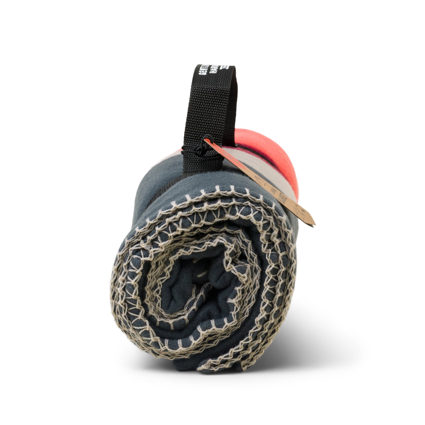 The Camping Blanket is lightweight in gray and orange, features beige stitching, and comes secured with a black strap and brown tag—ideal for outdoor adventures.