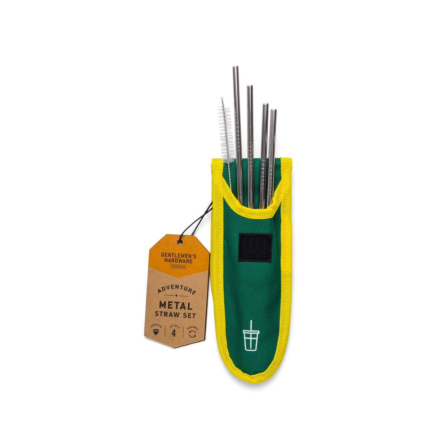 A green and yellow fabric pouch holds the Travel Metal Straw Set, featuring reusable metal straws and a cleaning brush, with a brown tag labeled Adventure Metal Straw Set attached.