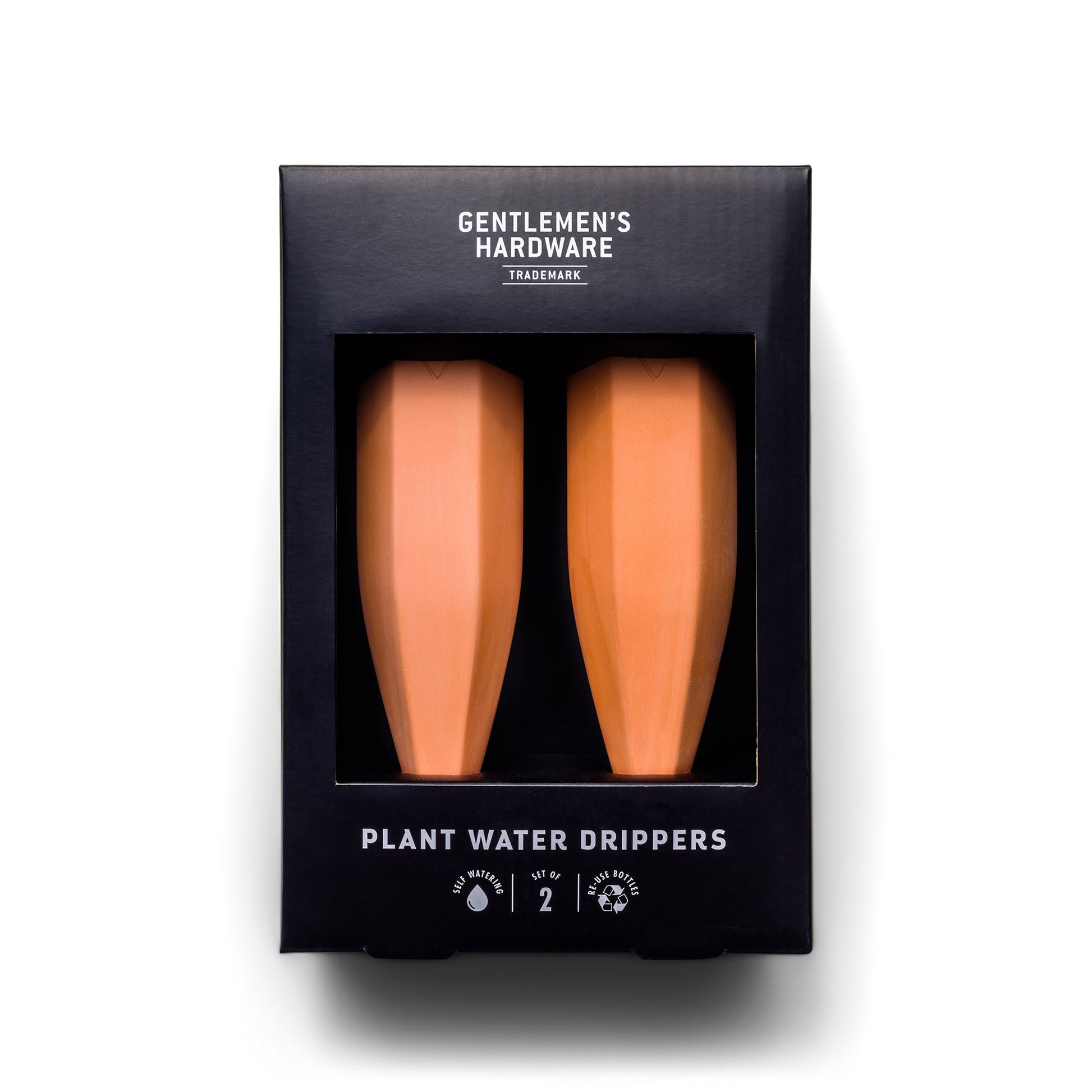 A black box labeled Terracotta Plant Water Drippers, set of 2 contains two water spikes, visible through a window in the packaging, ideal for effortless plant watering.