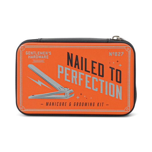 The Manicure Kit is an orange grooming set case labeled Nailed to Perfection, featuring nail clippers illustration and Gentlemen’s Hardware text.