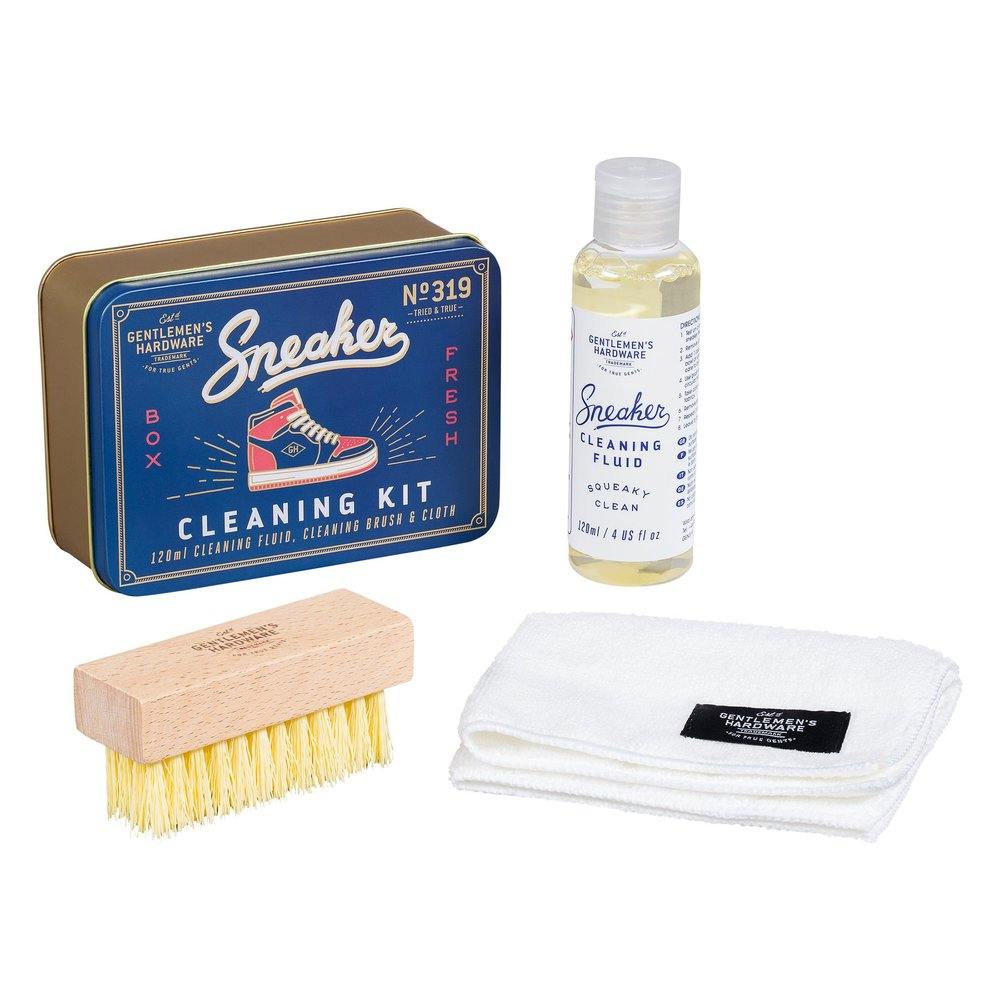 Sneaker Cleaning Kit comes with a compact tin box, powerful cleaning fluid, a wooden brush with yellow bristles, and a folded white cloth—ideal for keeping your sneakers fresh wherever you go.