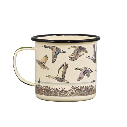 The Enamel Mug - Lake & Ducks 17 fl oz features a cream enamel finish with a black rim and illustrations of flying ducks over a marsh, making it perfect for outdoor adventures.