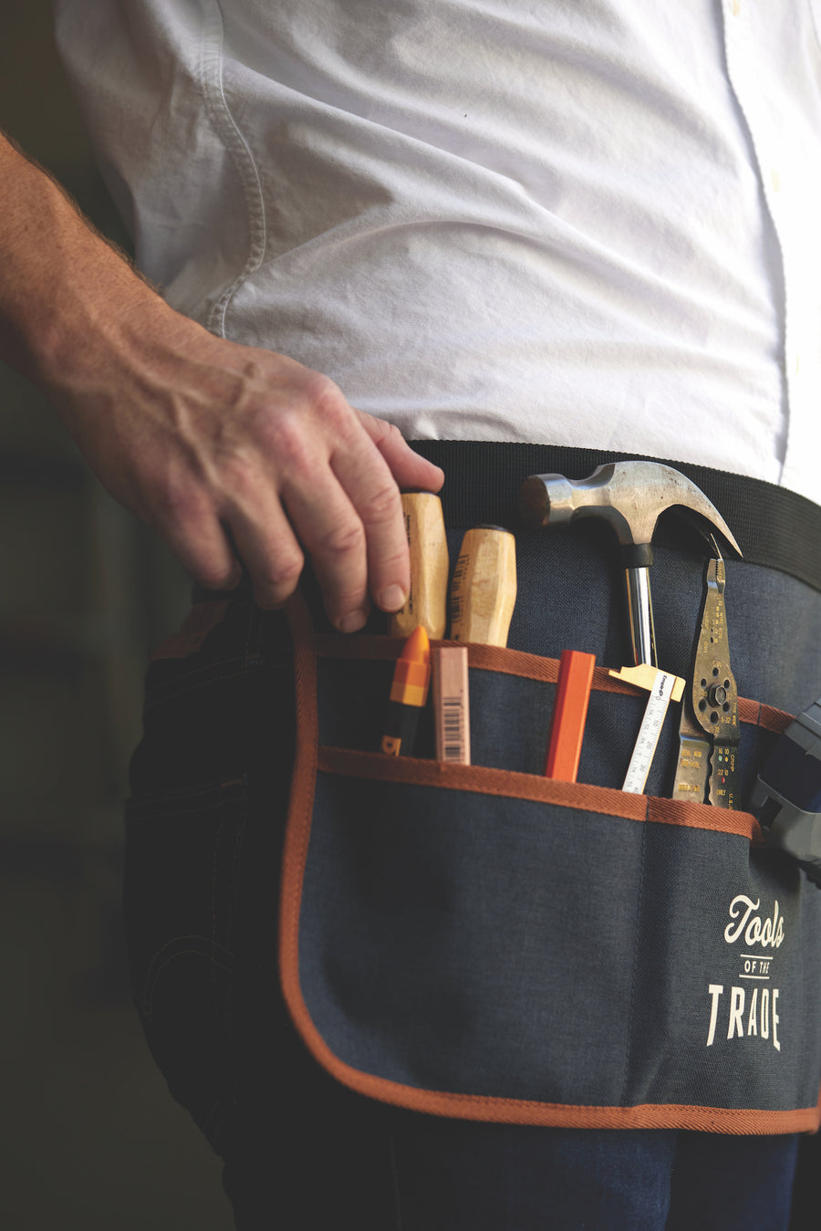 Man wearing the Utility Tool Belt with tools and carpenter pencils in the pouch